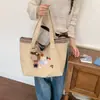 2026 Nova Bolsa de Ombro Grande de Nicho para Mulheres Senso de Design Bolsa Tote Fofa de Desenho Animado Bolsa Versátil Simples para Mulheres