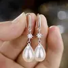 2025 Nuevo Estilo Caliente Pendientes de Moda de Lujo Accesible Ganchos de Oreja Únicos y Exquisitos Pendientes de Perla y Circonita Estilo Ins