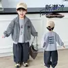 Chaqueta de Punto Rayada con Cuello Alto para Niños Otoño 2026 Nueva Chaqueta Casual Holgada para Bebé Top de Moda