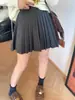 Saia plissada curta de tricô cintura alta, modeladora, estilo Miu para mulheres, nova coleção outono/inverno 2026, saia curta versátil em linha A, moderna