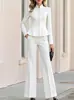 Amazon 2026 Ropa de otoño e invierno nueva transfronteriza europea y americana: conjunto de mujer con top de color liso de media altura con cremallera y pantalones de pierna ancha