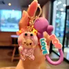 Chaveiro criativo de acrílico chapéu menina boneco casal chaveiro de carro pingente de bolsa máquina de pegar brinde pequeno