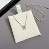 Pendientes de plata con aguja de plata y circonita de lujo ligero, temperamento de moda, comodín, cadena para la clavícula de alto nivel, joyería al por mayor de origen Yiwu