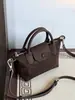 Otoño e Invierno 2025 Nuevo Bolso de Mano Tipo Dumpling de Piel de Vaca Gamuzada de Primera Capa Bolso Cruzado Versátil para Viajes Fábrica de Bolsos de Piel Genuina