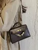 Bolso de mano texturizado con patrón de cocodrilo para mujer, nueva colección 2026, bolso de estilo Kelly, de nicho y lujoso, adecuado para el trabajo y el uso casual, se puede llevar como bolso de hombro o bolso cruzado