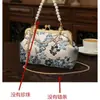 Bolso Cheongsam Estilo Chino Retro Nuevo Terminado con Falda de Cara de Caballo Hanfu Bolso Portátil Dorado Cruzado