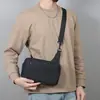 Bolso nuevo de nailon para hombre, bolso bandolera de un solo hombro, monedero vintage simple, bolso casual, bolso multifuncional de color liso