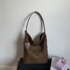 Colección de otoño 2026 transfronteriza: bolso de hombro de gran capacidad, minimalista, elegante, estilo coreano, moderno, casual y versátil para ir al trabajo