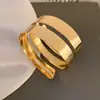 Explosões europeias e americanas de venda quente transfronteiriça pulseira de metal exagerado anel de braço oco nicho de jóias de temperamento high-end mulheres atacado