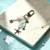 Cadena para teléfono de estrella de mar dulce y femenina estilo Ins, charm de estrella de metal simple y versátil para bolsos y accesorios de cámara CCD