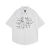 Camisa de manga curta com estampa de letras de cachorrinho retrô estilo japonês de verão 2025, camisa solta casual de marca da moda masculina e feminina para casais