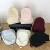 Mochila Casual Simple de Color Sólido Gran Capacidad Ligera Versátil Mochila de Viaje Hombres y Mujeres Exterior Estudiante Mochila Escolar Mujeres