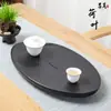 Bandeja de té de piedra negra dorada natural, mesa de té rectangular de piedra para uso doméstico, sensación de lujo ligero y alta gama, bandeja de té redonda pequeña