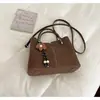 Elegante y estilosa cartera pequeña para mujer, nuevo bolso cruzado versátil de moda 2026, bolso de mano para el trabajo, bolso tipo cubo tote