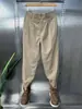 Pantalones de Pana para Hombre Estilo Otoño e Invierno 2026 Cintura Elástica Holgados Cremallera Pantalones Harem Cónicos Doble Pinza Casuales de Pana
