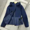 2026 Nueva Chaqueta Ligera de Plumas con Capucha Estilo Europeo Patchwork Corta Ajustada Abrigo de Moda Europea Tendencia para Mujer