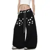 Exclusivo para ventas transfronterizas: Diseño de uso inverso estilo americano, pantalones de chándal unisex para danza jazz, pierna ancha, con cordón y estampado de estrellas, dobladillo curvo