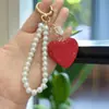 Pingente Criativo de Chaveiro Coração com Pedras Full Diamond, Corrente Fofa de Pérolas com Contas, Pingente Simples para Acessório de Bolsa de Chave de Carro
