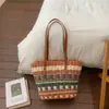 Bolso de paja estilo vacacional para mujer, nuevo bolso de hombro tejido para la playa de gran capacidad, verano 2026