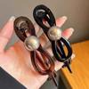 Elegante Pinza para el Cabello con Lazo y Perlas para Mujer 2026 Nuevo Estilo Pinza Retorcida de Gama Alta Pinza de Tiburón para la Parte Posterior de la Cabeza