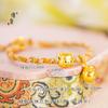 Tienda de oro Jin Yan con accesorios DIY de oro de arena, cuentas de transferencia de cabeza de oso Winnie the Poochie sonriente, pulsera de amantes con cuentas