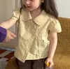 Novo Conjunto de 2 Peças Estiloso para Meninas 2026 Estilo Francês Camisa de Boneca Manga Curta Infantil Poá Camisa de Verão Shorts Versátil