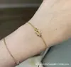 Hebilla de Herradura V Oro Mini Diamante Completo Fred Cadena de Cuerda Retorcida CNC Precisión Oro Rosa 18K Pulsera para Mujeres Versátil