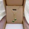 Collar de mujer: Collar de flor de circón esmeralda estilo europeo y americano transfronterizo, colgante de nuevo diseño, cadena elegante para la clavícula