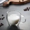 Taza de vidrio de doble capa borosilicato transparente leche jugo café Marca taza de agua oficina forma de huevo con asa Taza