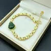 Pulsera de Buda, pulsera de trébol de cuatro hojas en forma de corazón, joyería electrochapada en aleación, accesorio de trébol de la suerte versátil unisex, venta al por mayor