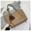 Bolso Transfronterizo Simple y Moderno de Gran Capacidad para Mujer 2026 Nuevo Modelo Bolso Tote para Estudiante Bolso de Hombro Retro para Viajes