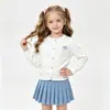 Cárdigan de Punto para Niña con Lazo Hueco de Manga Larga 2026 Primavera/Verano Nuevo Delgado Algodón Puro Transpirable Chaqueta de Aire Acondicionado