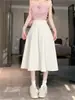 Toma real Talla grande MM gorda Falda de longitud media Primavera Verano Estilo coreano ins Cintura alta Adelgazante Longitud media Caída Plisada Gran campana acampanada Falda