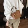 Bolso tote de tela cepillada transfronterizo para mujer, nuevo modelo 2026, bolso de hombro o axila de nicho vintage de alta calidad