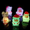 Luz nocturna navideña luminosa y colorida con diseño de Papá Noel o muñeco de nieve, ideal como regalo de Navidad.