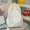 Mochila com padrão de ondas azul leitoso, estilo claro e artístico, estilo coreano, suave e versátil, adequada para viagens e passeios, faz o usuário parecer mais claro.