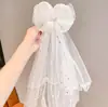 Pasador de perla blanca de princesa para niños tocado de bebé accesorios para el cabello niña cumpleaños boda lazo malla