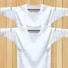 Camiseta de manga larga para hombre, nueva colección primavera/otoño 2026, capa base elástica, top de cuello redondo, versátil y moderno