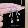 Pendientes versátiles de moda suave estilo francés para mujer, pendientes de lazo de lujo ligero de alta gama, pendientes de chica dulce al por mayor