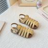 Sandalias Romanas Tejidas Huecas Cubre-dedos para Niñas 2025 Verano Nuevo Estilo Coreano Suela Suave para Niña con Falda Zapatos de Playa