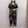 Traje de verão transfronteiriço feminino moda série sal emagrecedor redutor de idade temperamento maduro calça cropped manga curta conjunto de duas peças moda feminina