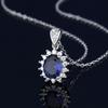 El nuevo anillo con microincrustaciones de zafiro con forma de corazón de océano y tesoro de color, collar y pendientes de temperamento transfronterizos de Europa y Estados Unidos para mujeres, venta al por mayor en vivo
