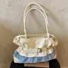 Bolsa de Mano para Mujer de Diseño Nicho, Textura de Alta Gama, Estilo Simple, Nueva Colección Primavera 2026, Transfronteriza, Hombro Único, Axila, Cruzada