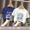Camiseta de manga larga para niño, nuevo modelo primavera y otoño 2026, top estiloso para niños, camiseta base de moda de imitación de dos piezas para niños mayores