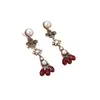 Pendientes Retro Vintage Franceses de Cristal Rojo y Perla con Borlas Largas de Flor de Iris Estilo Antiguo y Pendientes de Lujo Ligero