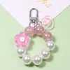 Llavero de Flor con Cara Sonriente Colgante DIY para Funda de Teléfono Móvil Cubierta Protectora para Aripods Colgante para Estuche de Auriculares Joyería