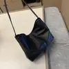 Bolso de hombro de cuero suave para mujer, nuevo modelo 2026, bolso tote de gran capacidad, bolso cruzado versátil de piel de oveja para el día a día, bolso de axila de alta gama