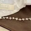 Pulsera Flor de Lis Perla Manta en Plata Blanca con Cristales Swarovski Completamente Diamantados, Accesorio de Mano Ajustable, Exquisita Pulsera de Cuentas Cielo Estrellado