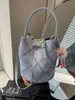 Bolso popular de este año para mujer 2024 nuevo diseño de bolso bandolera nicho de verano bolso de cubo de diamantes portátil