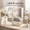 Novo espelho de maquiagem LED transfronteiriço, de mesa com luzes, dobrável e com ampliação, popular entre celebridades da internet, adequado para uso em dormitório e quarto